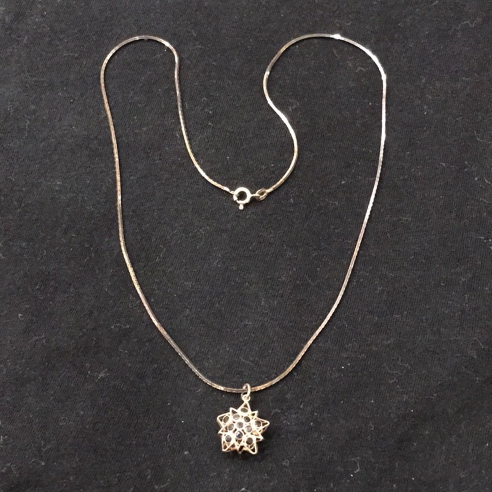 STERLING SILVER NECKLACE WITH PUFFED STAR PENDANT STUDDED W/ DARK BLUE SAPPHIRES